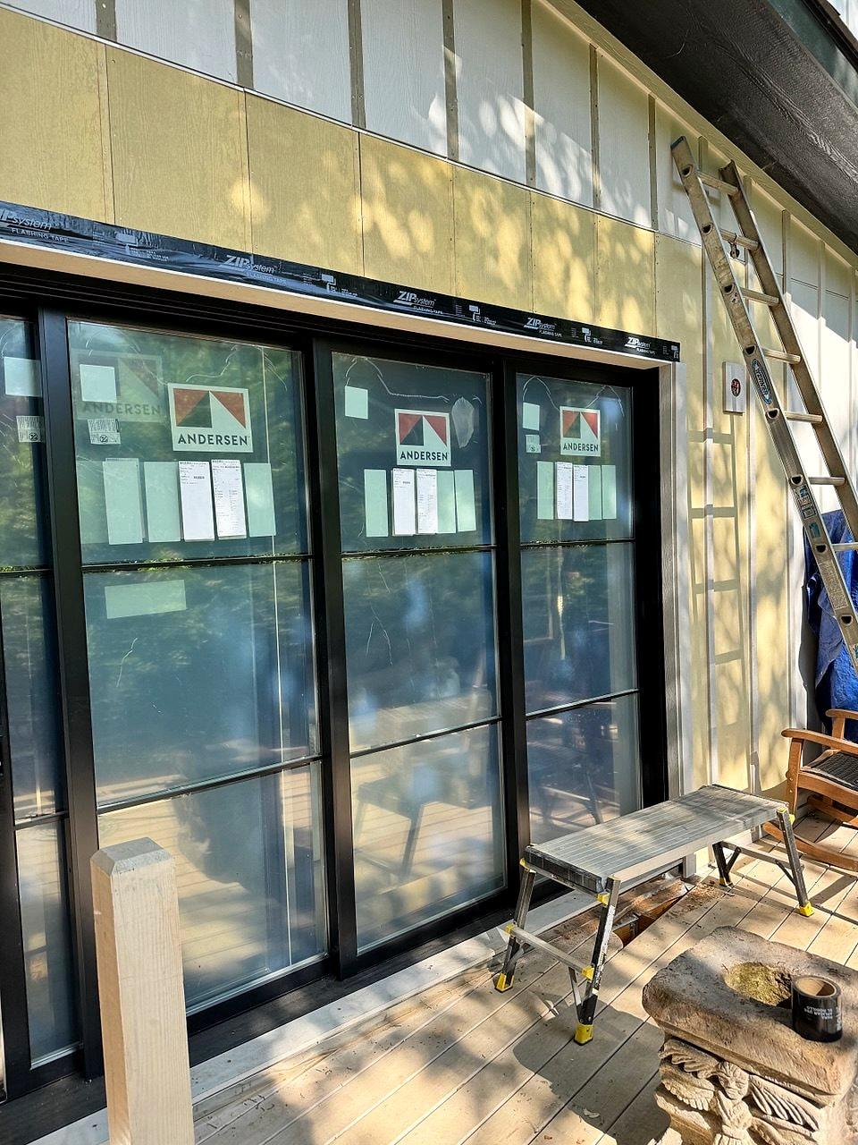 Large new sliding window wall being installed